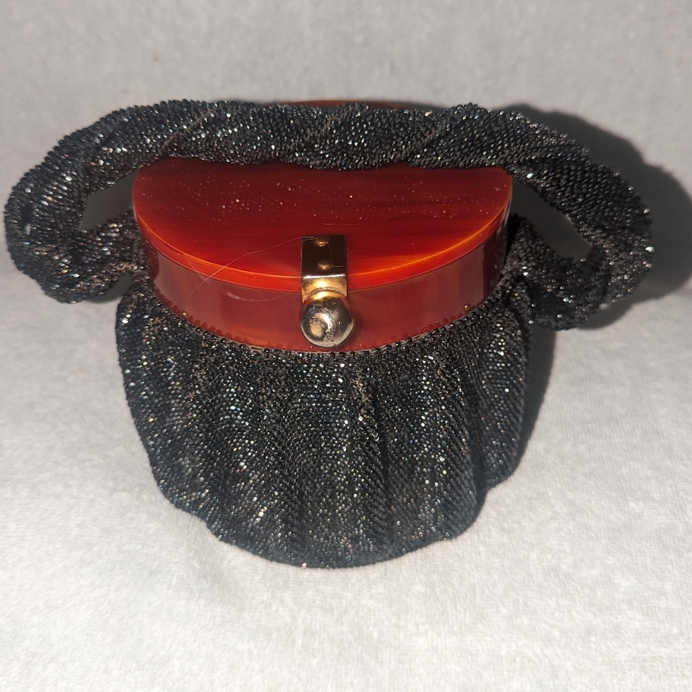 Vintage beaded bag with bakelite top